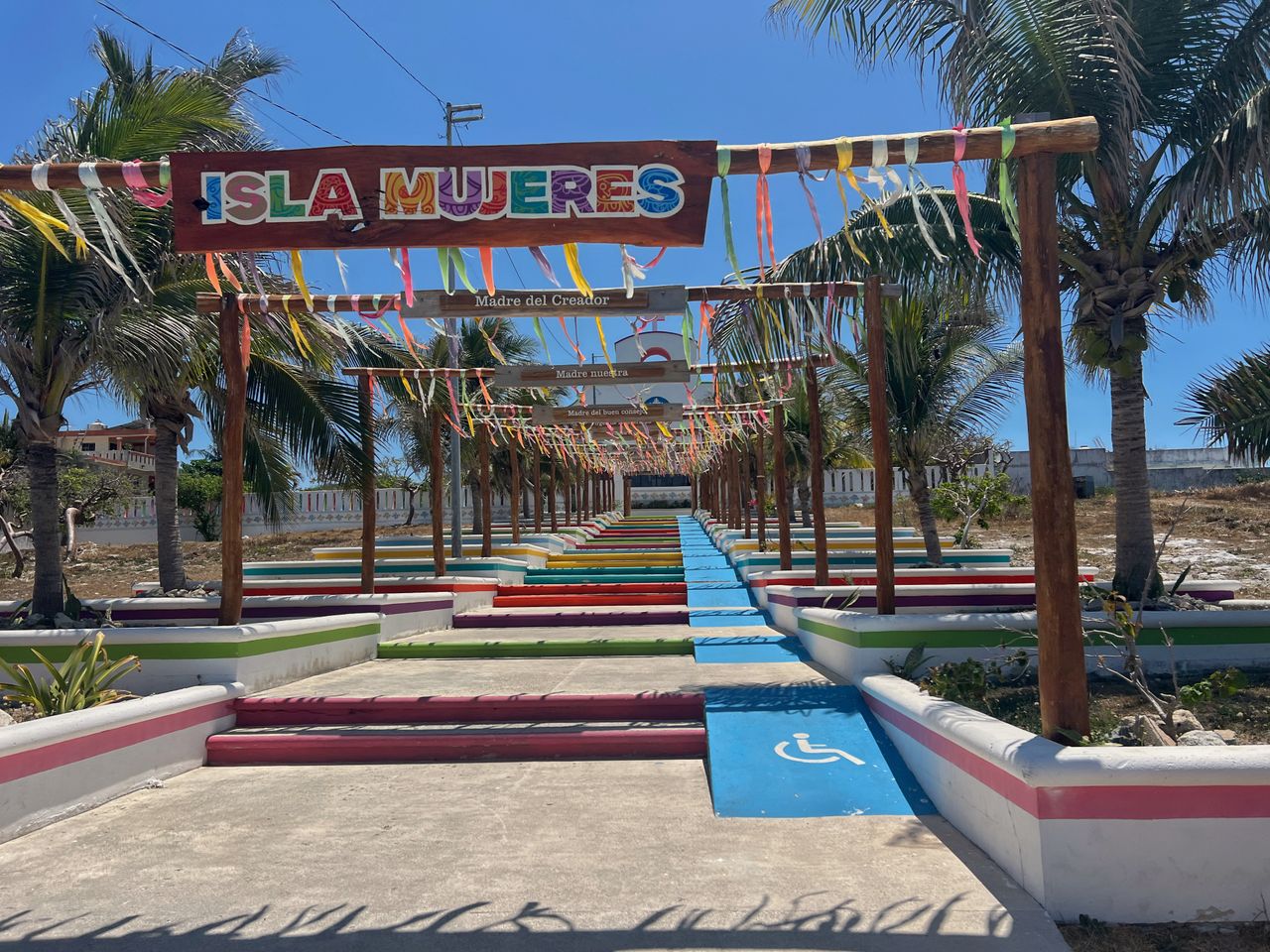 Services Colorful archway and entrance at Isla Mujeres, vibrant and inviting.